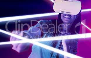 Composite image of woman gesturing while using virtual reality headset