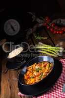 colorful turkey fricassee with asparagus and paprika