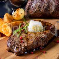 Butter Beef Steak with herbs and potato wedges