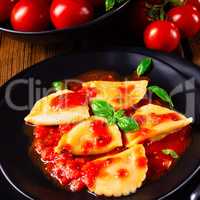 ravioli alla genovese with basil tomato sauce