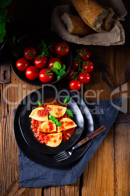 ravioli alla genovese with basil tomato sauce