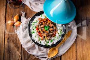 Tajin beef stew with rice paprika and sesame seeds