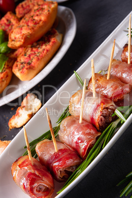 dates wrapped in bacon and delicious tapas