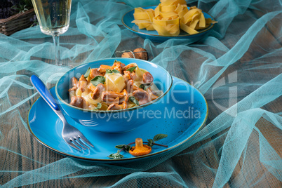pappardelle with cheese sauce and fresh chanterelles