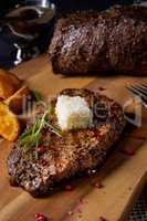 Butter Beef Steak with herbs and potato wedges