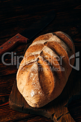 Rye bread with knife.