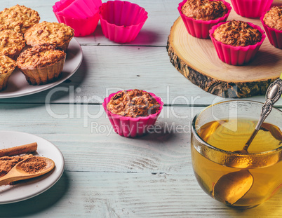 Oatmeal muffins with cup of green tea.