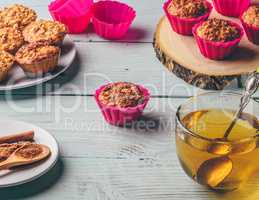 Oatmeal muffins with cup of green tea.