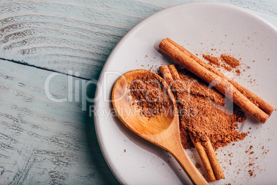 Cinnamon on white plate.