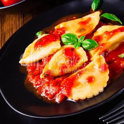 ravioli alla genovese with basil tomato sauce