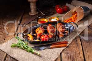 grilled chicken legs in barbecue marinade with sweet potatoes