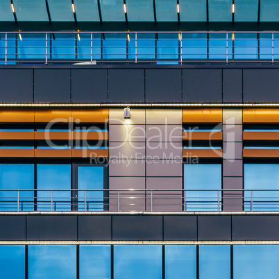 Modern high-rise building with a glass facade.