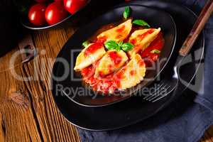 ravioli alla genovese with basil tomato sauce