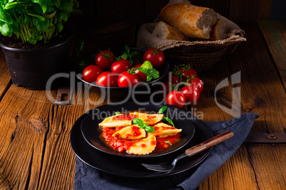 ravioli alla genovese with basil tomato sauce