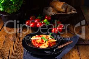 ravioli alla genovese with basil tomato sauce