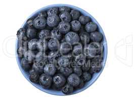 Bowl full of fresh ripe blueberries on white background.