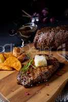 Butter Beef Steak with herbs and potato wedges