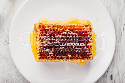 Honeycomb on white plate
