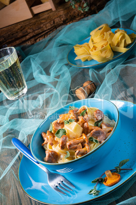 pappardelle with cheese sauce and fresh chanterelles