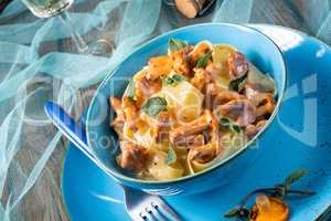 pappardelle with cheese sauce and fresh chanterelles