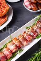 dates wrapped in bacon and delicious tapas