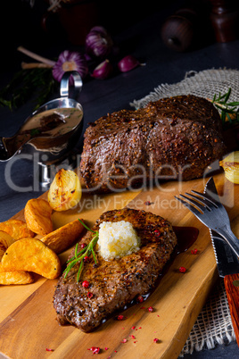 Butter Beef Steak with herbs and potato wedges