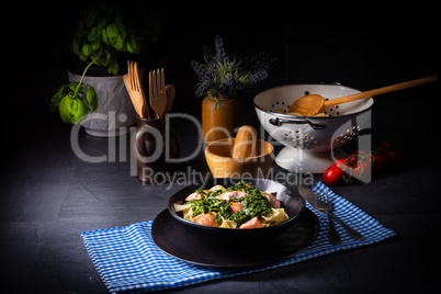 pappardelle pasta with creamed spinach and fried salmon