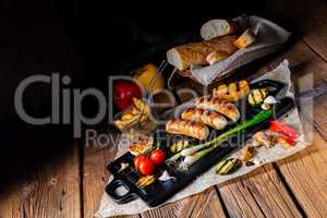 Delicious  grilled sausage with various grilled vegetables