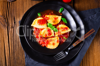 ravioli alla genovese with basil tomato sauce