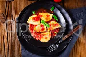 ravioli alla genovese with basil tomato sauce