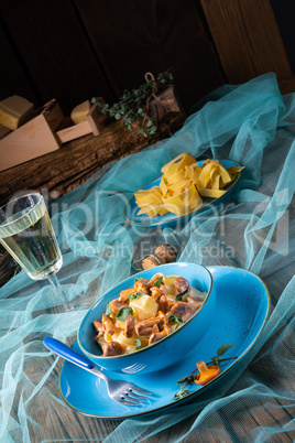 pappardelle with cheese sauce and fresh chanterelles