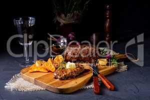 Butter Beef Steak with herbs and potato wedges