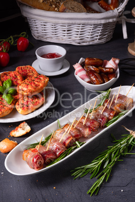 dates wrapped in bacon and delicious tapas