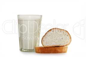Glass with milk product and bread