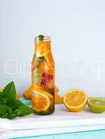 summer refreshing drink lemonade with lemons, cranberry, mint le