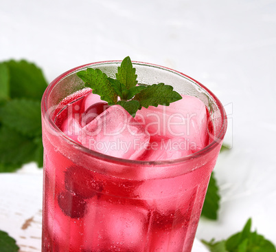 summer refreshing drink with berries of cranberries