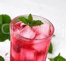 summer refreshing drink with berries of cranberries