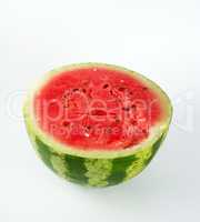 half round ripe red watermelon with brown seeds