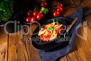 ravioli alla genovese with basil tomato sauce