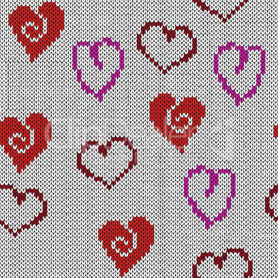 Knitting seamless pattern for Valentine's Day with various hearts