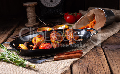 grilled chicken legs in barbecue marinade with sweet potatoes