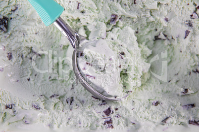 Top view of mint flavour ice cream with chocolate flakes in box