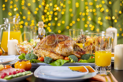 Roasted turkey on festive table for Thanksgiving celebration