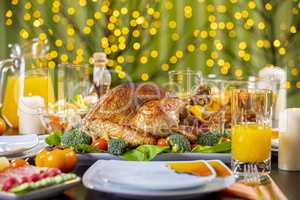 Roasted turkey on festive table for Thanksgiving celebration