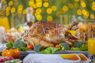 Roasted turkey on festive table for Thanksgiving celebration