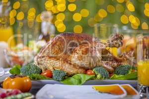 Roasted turkey on festive table for Thanksgiving celebration