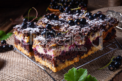 Polish cake from tin with fruit and sprinkles