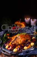 roast duck with potato dumplings and plums