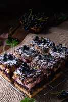 Polish cake from tin with fruit and sprinkles