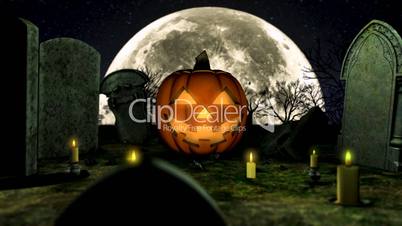 Pumpkin Jack o lantern at night in the cemetery